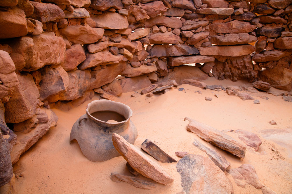Old stone house and clay pot of early inhabitants