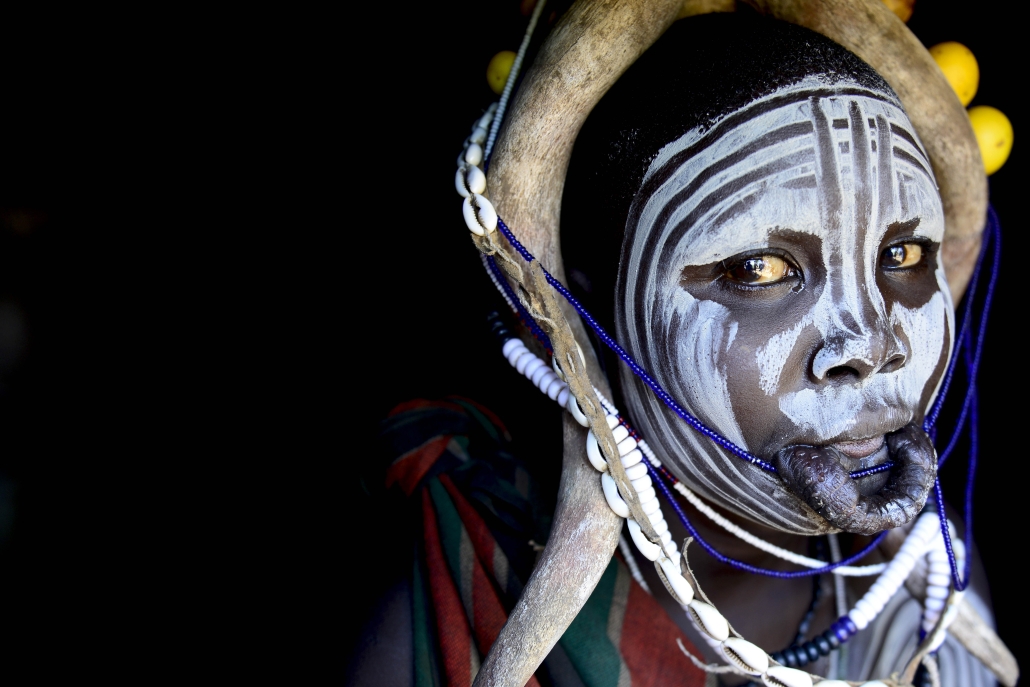 Woman in traditional dress. Mursi tribe, Mago National Park. Omo Valley, Ethiopia.