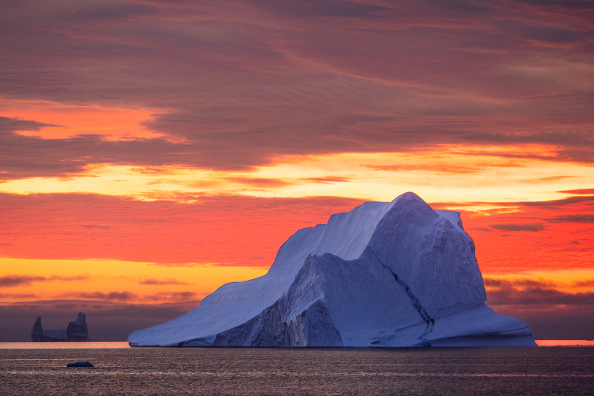 Iceberg in East Greenland at sunrise
